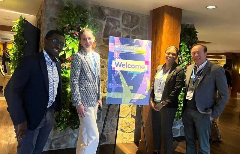 DY Team posed in front of the 2024 NEC/AAAE Airports Conference-Content Matters